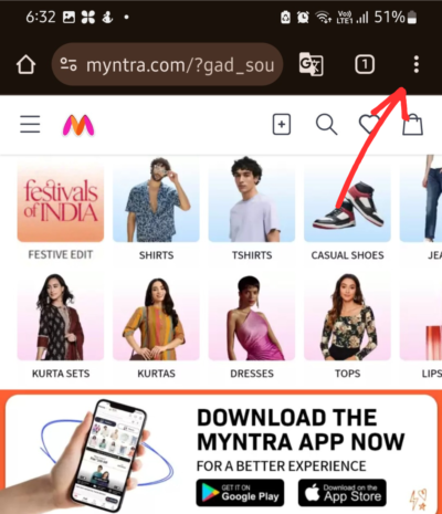 A screenshot of Myntra website on chrome browser with an arrow showing the three dots in the top right corner